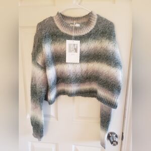 Grey cable-knit sweater